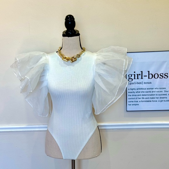 White bodysuit with sheer puff sleeves. - Picture 1 of 2